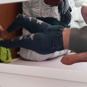 Dark blue ripped jeans